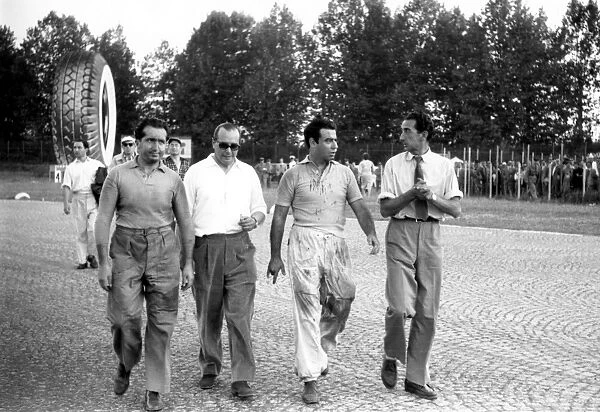 1953 Italian Grand Prix: Alberto Ascari, 3rd position and Onofre Marimon, rerired, walk back to the pits, portrait