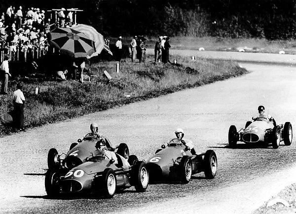 1953 Italian Grand Prix: Juan Manuel Fangio leads Giuseppe Farina, Alberto Ascari and Onofre Marimon during their battle for the lead. Fangio