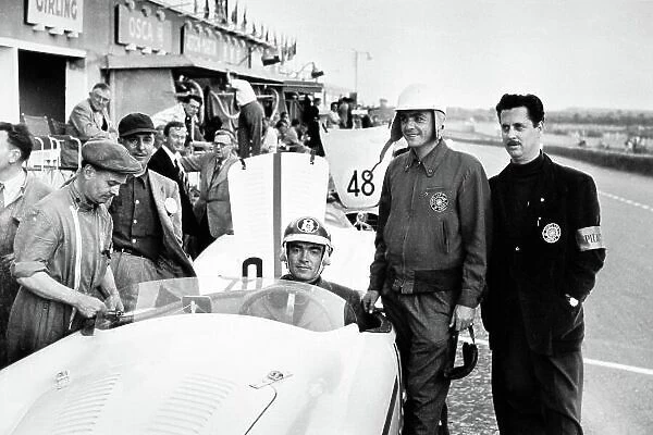 1953 Le Mans 24 hours. Le Mans, France. 13-14 June 1953. Fred Wacker jr (in car) and Phil Hill pose by the OSCA MT4 entered by Rees T. Makins. Makins was also reserve driver, portrait. World Copyright: LAT Photographic Ref: Autosport b&w print