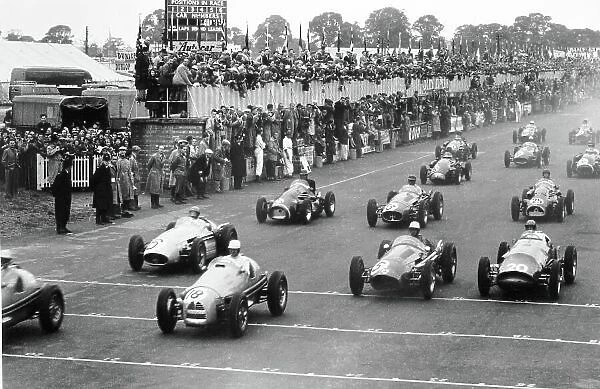 1954 British Grand Prix. Silverstone, Great Britain. 17 July 1954. With the leaders gone Clemar Bucci, Gordini 16 #18, retired, 'B Bira', Maserati 250F #6, retired, Roy Salvadori, Maserati 250F #5, retired, and Peter Collins, Vanwall Special #20