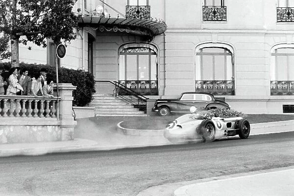 1955 Monaco Grand Prix. Monte Carlo, Monaco. 22 May 1955. Stirling Moss, Mercedes-Benz W196, retires. He was classified in 9th position, action. World Copyright: LAT Photographic Ref: Autosport b&w print. Published: Autosport 27 / 5 / 1955 p664