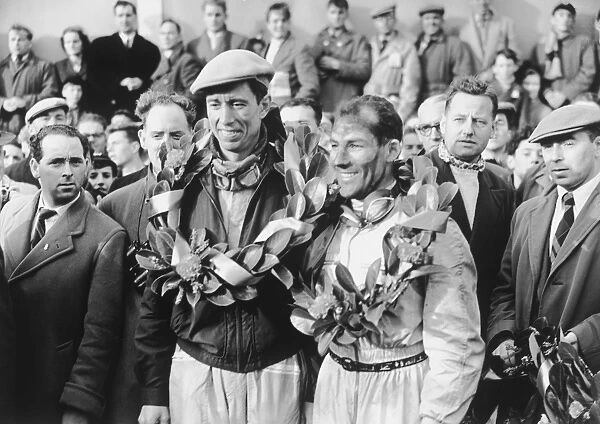 1955 Tourist Trophy: Stirling Moss  /  John Fitch, 1st position, with the winning laurels, portrait
