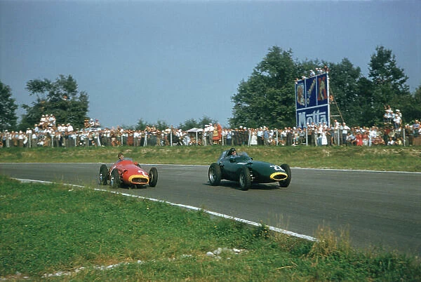 1957 Italian Grand Prix. Monza, Italy. 31 / 8-2 / 9 1957. Tony brooks (Vanwall) followed by Juan Manuel Fangio (Maserati 250F). Ref-57 ITA 37. A Race Through Time exhibition number 94. World Copyright - LAT Photographic