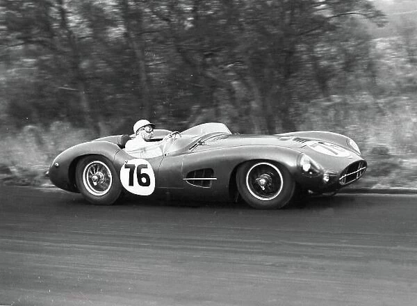 1958 British Empire Trophy. Oulton Park, England. 12 April 1958. Stirling Moss (Aston Martin DBR2), 1st position and lap record. Action. World Copyright: LAT Photographic Ref: C51197