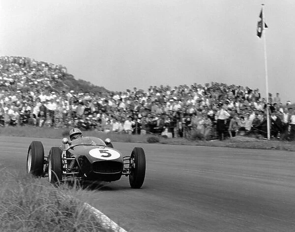 1960 Dutch Grand Prix. Zandvoort, Holland. 6th June 1960. Alan Stacey (Lotus 18-Climax), retired, action. World Copyright: LAT Photographic. Ref: 6537