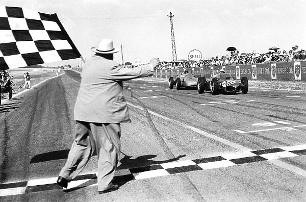 1961 French Grand Prix. Reims-Gueux, France. 30  /  6-2  /  7 1961. Giancarlo Baghetti (Ferrari 156) closely followed by Dan Gurney (Porsche 718), takes the chequered flag for 1st position and his maiden win on his Grand Prix debut