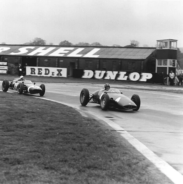 1961 Lavant Cup: Stirling Moss, 1st postition, chases Graham Hill, 3rd position, action