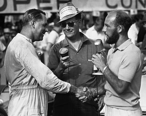 1963 Australian Grand Prix: Stirling Moss congratulates Jack Brabham after his victory, portrait