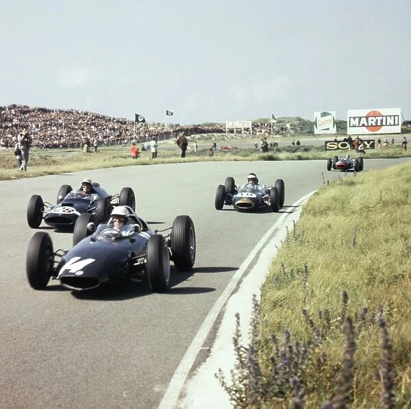 1963 Dutch Grand Prix: Richie Ginther leads Jo Bonnier and Dan Gurney. Gurney finished in 2nd position