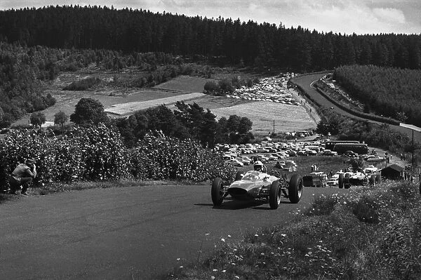 1963 German Grand Prix - Start: John Surtees, 1st position, leads Jim Clark, 2nd position, action