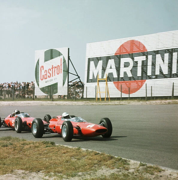 1964 Dutch Grand Prix. Zandvoort, Holland. 22-24 May 1964. Lorenzo Bandini (Ferrari 158) closely followed by Giancarlo Baghetti (BRM P57). Ref-1253. World Copyright - LAT Photographic
