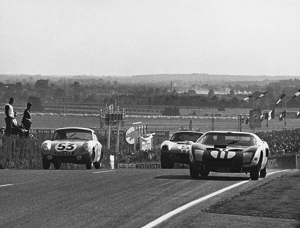 1964 Le Mans 24 Hours: Richie Ginther  /  Masten Gregory, retired, passes Bob Bondurant  /  Dan Gurney, 4th position and Clive Baker  /  Bill Bradley, 24th position