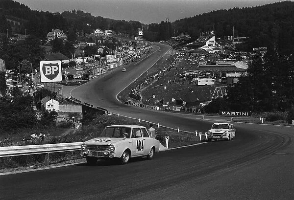 1964 Spa 24 hours. Spa-Francorchamps, Belgium. 25th - 26th July 1964. Gerhard Bodmer  /  Dieter Schmid (Glas 1204 TS), 8th position, leads Kelly  /  Ted Lund  /  Alan Mann (Ford Lotus Cortina), 9th position, action. World Copyright: LAT Photographic