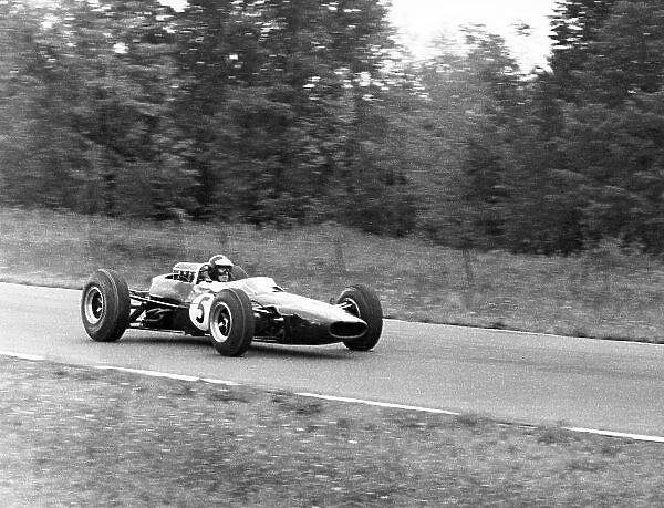 1965 United States Grand Prix. Watkins Glen, United States. 3 October 1965. Jim Clark, Lotus 33-Climax, retired, action. World Copyright: LAT Photographic Ref: b&w print