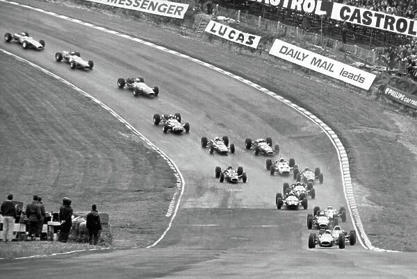 1966 British Grand Prix. Brands Hatch, Great Britain. 16 July 1966. Jack Brabham, Brabham BT19-Repco, 1st position, leads Dan Gurney, Eagle AAR101-Climax, retired, Denny Hulme, Brabham BT20-Repco, 2nd position, Jim Clark, Lotus 33-Climax