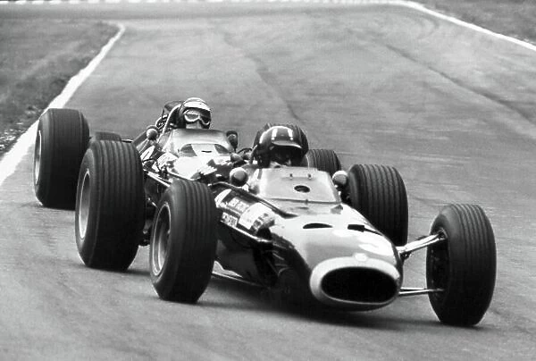 1966 British Grand Prix. Brands Hatch, Great Britain. 16 July 1966. Graham Hill, BRM P261, 3rd position, leads Jim Clark, Lotus 33-Climax, 4th position, action. World Copyright: LAT Photographic Ref: L66 / 463 / 34