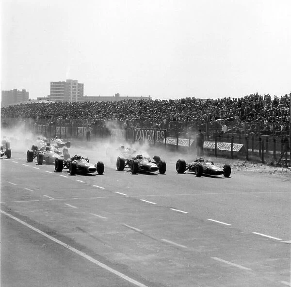 1966 Dutch Grand Prix. Zandvoort, Holland. 24 July 1966. Jack Brabham, Brabham BT19-Repco, 1st position, Denny Hulme, Brabham BT20-Repco, retired, and Jim Clark, Lotus 33-Climax, 3rd position, lead at the start