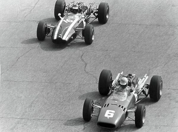 1966 Italian Grand Prix. Monza, Italy. 4 September 1966. Ludovico Scarfiotti, Ferrari 312, 1st position, leads Jochen Rindt, Cooper T81-Maserati, 4th position, action. World Copyright: LAT Photographic Ref: Motor b&w print