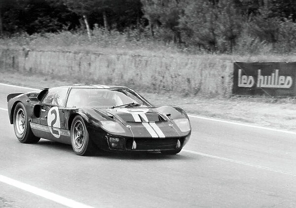 1966 Le Mans 24 Hours Le Mans, France. 22nd June 1966 Moment of victory for Fords, the 7 litre Ford GT40 of Bruce McLaren and Chris Amon, crosses the finish line to lead a Ford 1-2-3 result. World Copyright: LAT Archive