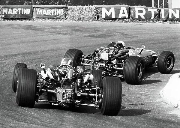 1967 Belgian Grand Prix. Spa-Francorchamps, Belgium. 18 June 1967. Guy Ligier, Cooper T81-Maserati, 10th position, leads Jo Siffert, Cooper T81-Maserati, 7th position, action. World Copyright: LAT Photographic Ref: Motor b&w print