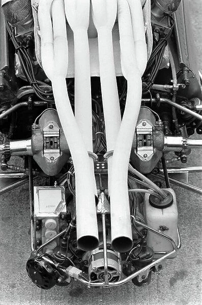 1967 British Grand Prix. Silverstone, England. 13th - 15th July 1967. Rd 6. Exhaust detail of the Chris Amon Ferrari 312. World Copyright : LAT Photographic. Ref : L67_533_1A