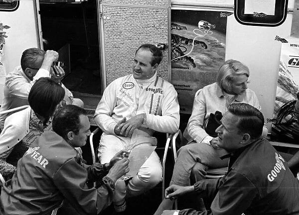 1967 GERMAN GP - NURBURGRING Race winner Denny Hulme relaxes in the paddock>