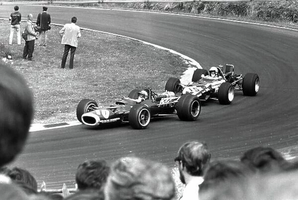 1968 British Grand Prix. Brands Hatch, Great Britain. 20 July 1968. Pedro Rodriguez, BRM P133, retired, leads Vic Elford, Cooper T86B-BRM, retired, action. World Copyright: LAT Photographic Ref: Motor b&w print