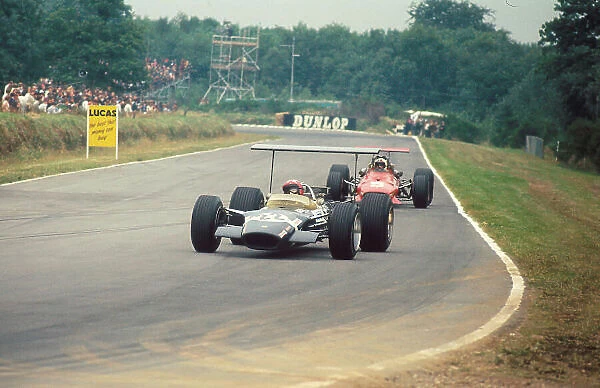 1968 British Grand Prix. Brands Hatch, England. 18-20 July 1968. Jo Siffert (Lotus 49B Ford) 1st position, followed by Chris Amon (Ferrari 312) 2nd position. This was Siffert's maiden Grand Prix win. Ref-68 GB 17. World Copyright - LAT Photographic
