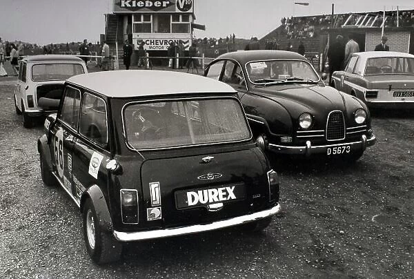 1969 Dutch Grand Prix. Zandvoort, Holland. 21 June 1969. Cars parked in the paddock showing early Durex sponsorship, atmosphere. World Copyright: LAT Photographic Ref: Autocar b&w print