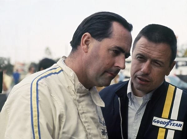 1969 Formula One World Championship: Jack Brabham in converstion with Leo Mehl, Goodyear tyres, portrait