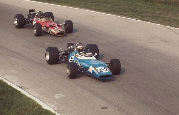1969 Italian Grand Prix: Jackie Stewart 1st position, followed by Graham Hill