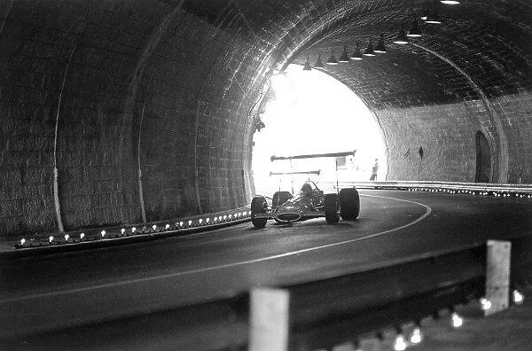 1969 Monaco Grand prix. Monte Carlo, Monaco. 18 May 1969. Denny Hulme, McLaren M7A-Ford, 6th position, action. World Copyright: LAT Photographic. Ref: 2472 - 23A