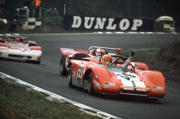1971 BOAC 1000 kms. Brands Hatch, England. 4th April 1971. Rd 4. Jo Bonnier  /  Peter Westbury (Lola T212 Ford), 8th position, lets Clay Regazzoni  /  Jacky Ickx (Ferrari 312 PB), 2nd position, through, action. World Copyright: LAT Photographic