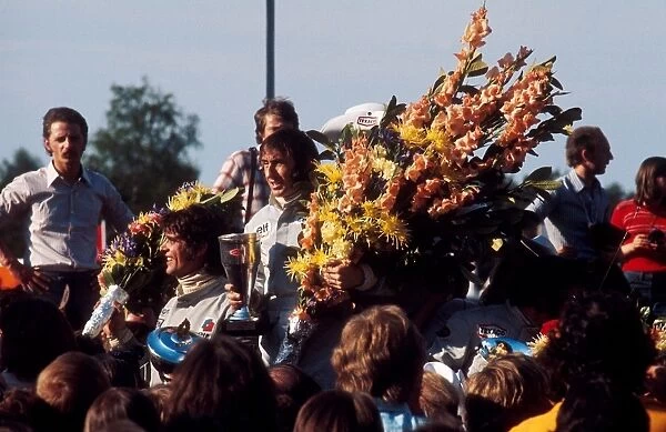 1973 Belgian Grand Prix: Jackie Stewart 1st position, Francois Cevert 2nd position and Emerson Fittipaldi 3rd position on the podium