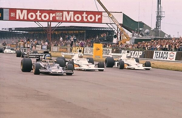 1973 British Grand Prix: Ronnie Peterson leads Denny Hulme and Peter Revson at the start