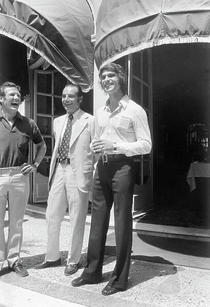 1973 Monaco Grand Prix: Francois Cevert and Bernard Cahiershare a joke. Portrait