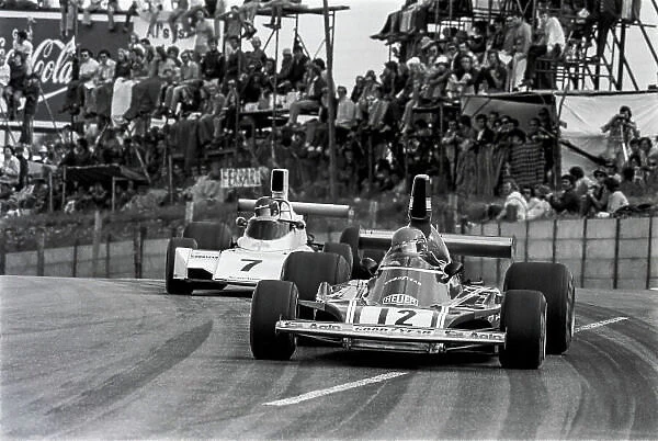 1974 South African Grand Prix. Kyalami, South Africa. 28th - 30th March 1974. Niki Lauda, Ferrari 312B3, 16th position leads Carlos Reutemann, Brabham BT44 Ford, 1st position, action. World Copyright: LAT Images. Ref: 6130 - 22A