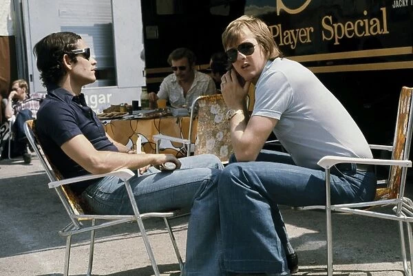 1974 Spanish Grand Prix - Ronnie Peterson and Jacky Ickx: Jacky Ickx and Ronnie Peterson chat in the paddock, portrait