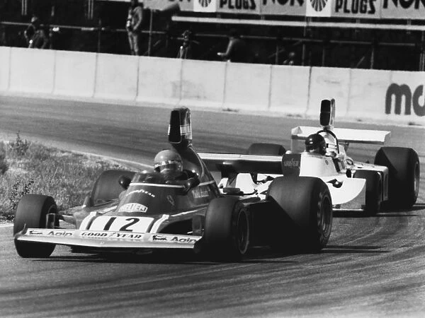 1974 Swedish Grand Prix: Anderstorp, Sweden. 7th - 9th June 1974. Niki Lauda, retired leads James Hunt, 3rd position, action