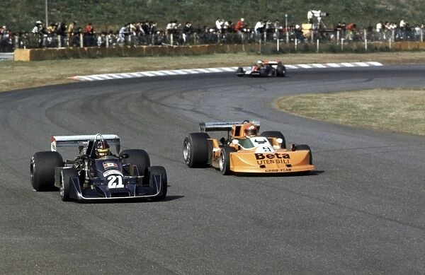 1976 Japanese Grand Prix: Masami Kuwashima leads Vittorio Brambilla during practice. He was replaced before the race due to lack of finance, action