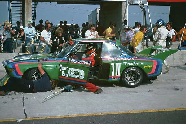 1976 Watkins Glen 6 hours. Watkins Glen, New York State, USA. 10th July 1976. Rd 6. Ronnie Peterson / Dieter Quester (BMW 3 5 CSL), 5th position, driver change and pit stop, action. World Copyright: LAT Photographic. Ref: 76 SCARS