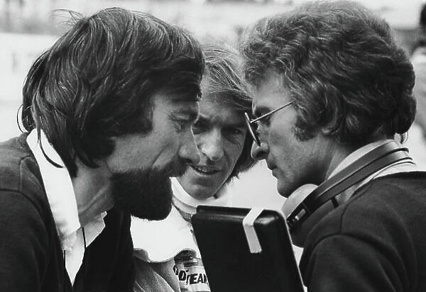 1977 South African Grand Prix. Kyalami, South Africa. 3 - 5 March 1977. J.F.Robin, Jacques Laffite and Gerard Ducarouge in conversation, portrait. World Copyright: LAT Photographic. Ref: B / W Print