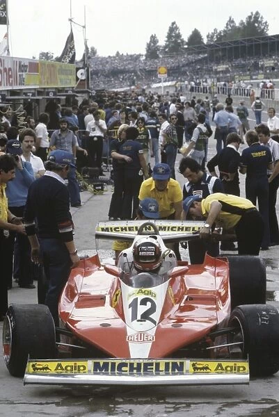 1978 British Grand Prix - Gilles Villeneuve: Gilles Villeneuve, retired, on the starting grid before the start of the race, action