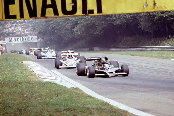 1978 Italian Grand Prix Monza, Italy. September 1978 Ronnie Peterson (Lotus 78) leads Alan Jones and the rest of the field on the race warm-up lap. Peterson suffered fatal injuries in an accident at the first corner of the race
