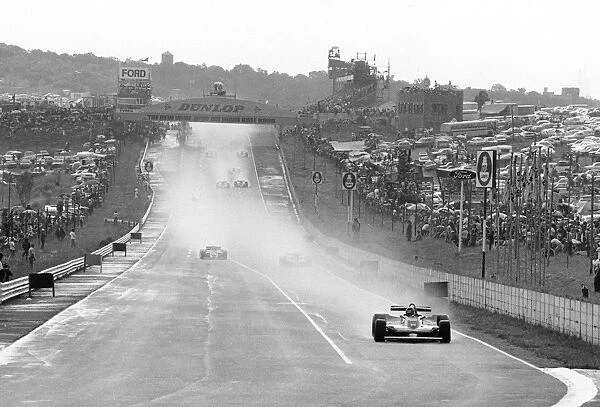 1979 South African Grand Prix: Gilles Villeneuve 1st position, lap 2 action just before red flag due to downpour of rain, action