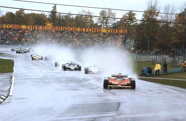 1979 United States Grand Prix: Gilles Villeneuve heads Alan Jones, Jacques Laffite and the rest of the field at the start