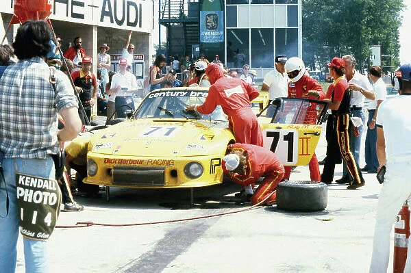 1979 Watkins Glen 6 hours. Watkins Glen, New York State, USA. 7th July 1979. Rd 7. Rob McFarlin  /  Roy Woods  /  Bob Akin (Porsche 935), 3rd position, pit stop action. World Copyright: LAT Photographic. Ref: 79 SCARS