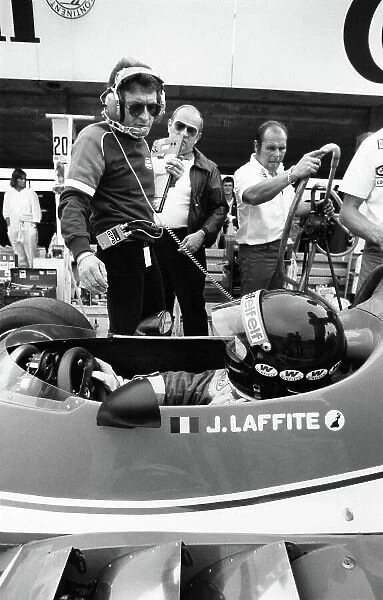 1980 Argentine Grand Prix. Buenos Aires, Argentina. 11-13 January 1980. Jaques Laffite (Ligier JS11 / 15-Ford), retired, talks to Gerard Ducarouge in the pit lane, portrait. World Copyright: LAT Photographic. Ref: B / W Print