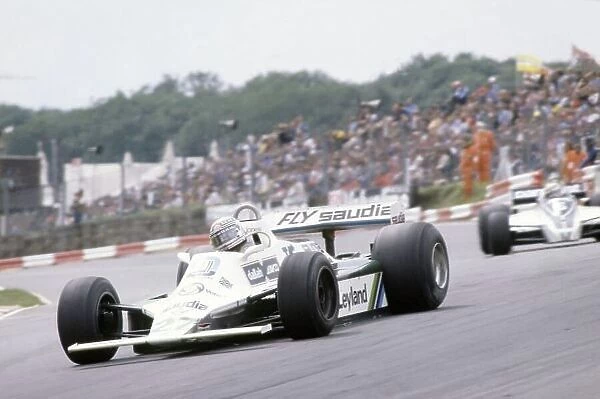 1980 British Grand Prix. Brands Hatch, Great Britain. 11-13 July 1980. Alan Jones (Williams FW07B-Ford Cosworth), 1st position, leads Nelson Piquet (Brabham BT49-Ford Cosworth)