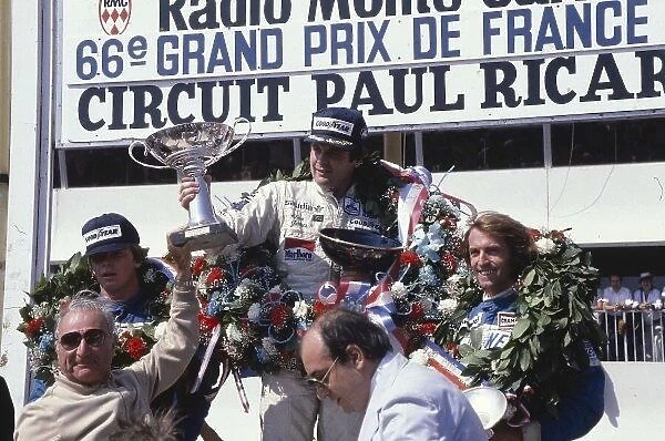 1980 French Grand Prix. Paul Ricard, France. 27-29 June 1980. Alan Jones (Williams Ford) 1st position, Didier Pironi 2nd position and Jacques Lafitte 3rd position (Both Ligier Ford) on the podium. Ref-80 FRA 13. World Copyright - LAT Photographic